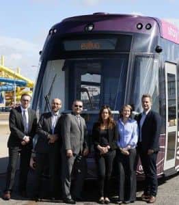 All aboard! The eviivo team in front of one of the trams