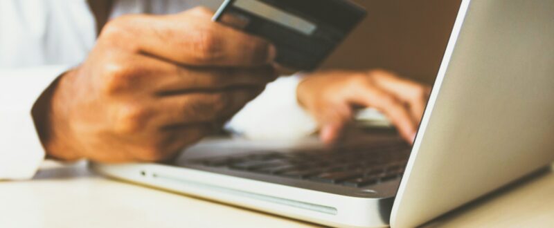 A guest pays for their upcoming accommodation booking online using a credit card